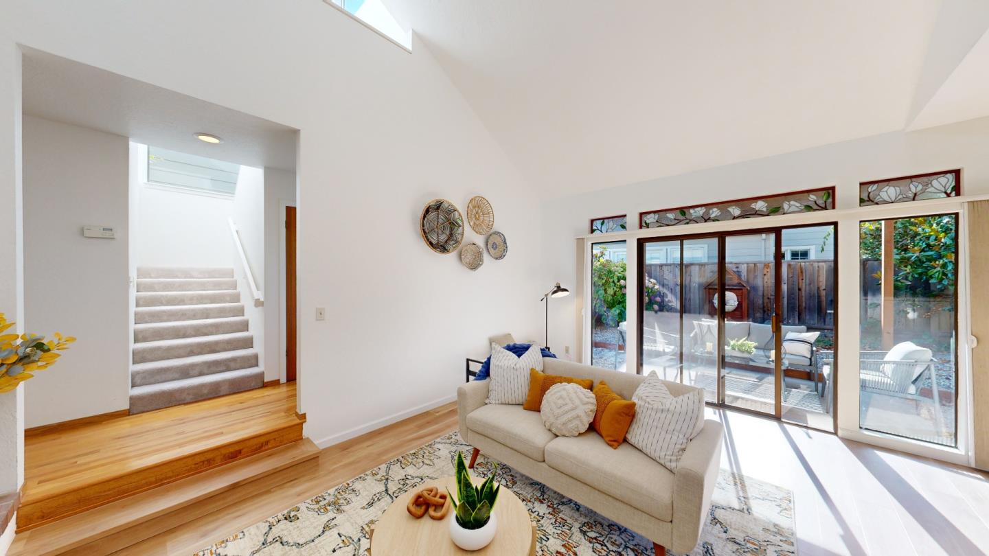 4493 Merlin Way Soquel, CA 95073 - Photo 50 of 52 a living room with furniture and a floor to ceiling window