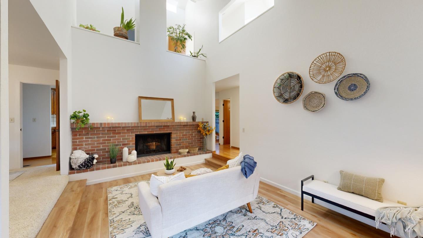 4493 Merlin Way Soquel, CA 95073 - Photo 5 of 52 a living room with furniture and a fireplace
