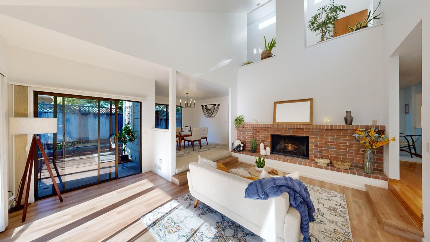 4493 Merlin Way Soquel, CA 95073 - Photo 52 of 52 a living room with furniture and a fireplace
