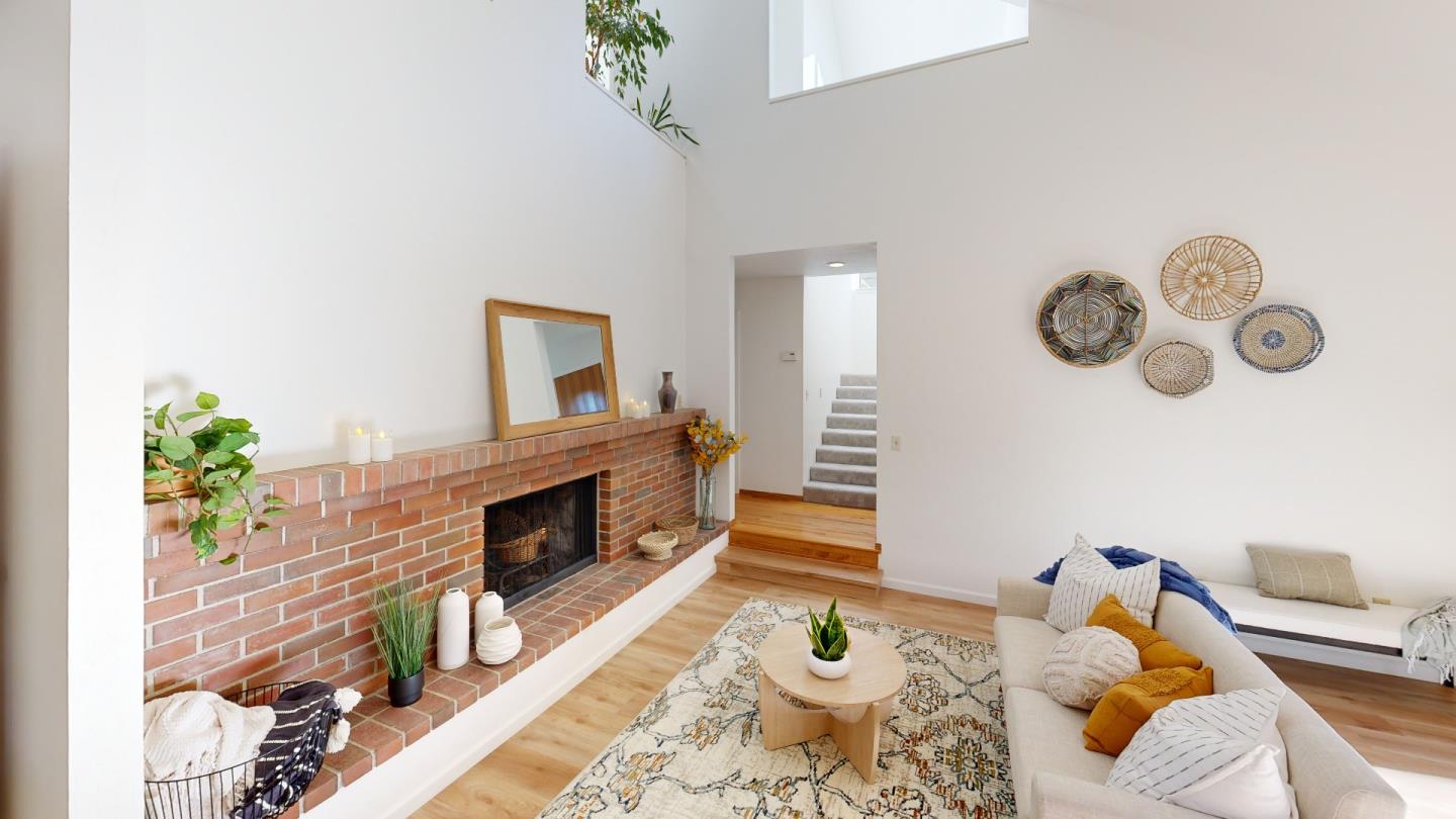 4493 Merlin Way Soquel, CA 95073 - Photo 6 of 52 a living room with furniture and a fireplace