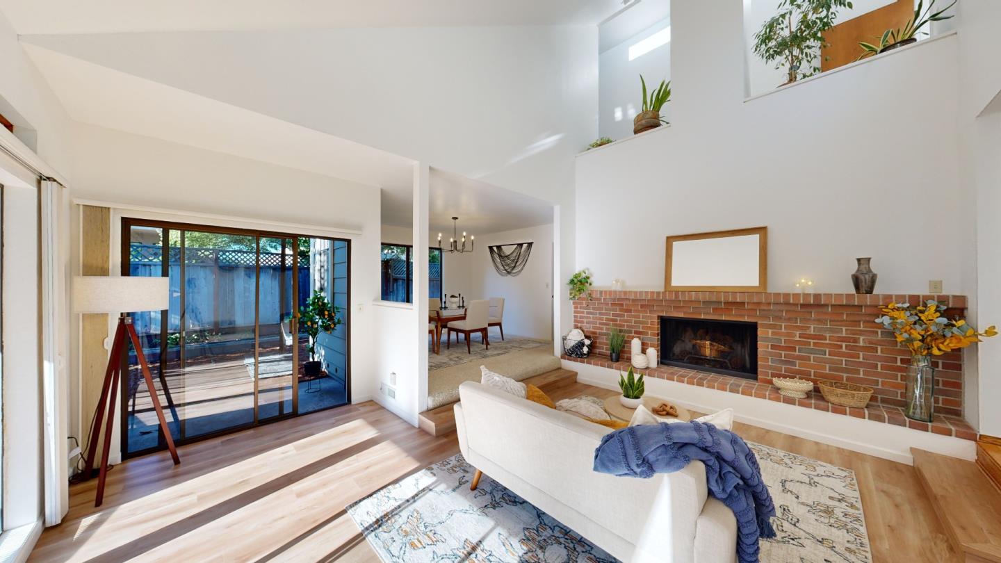 4493 Merlin Way Soquel, CA 95073 - Photo 7 of 52 a living room with furniture and a fireplace