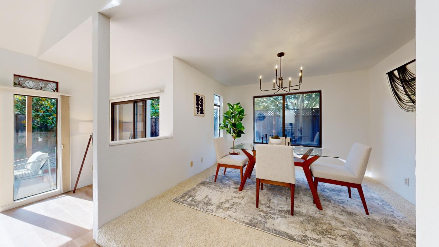 4493 Merlin Way Soquel, CA 95073 - Photo 8 of 52 a dining room with furniture window and wooden floor