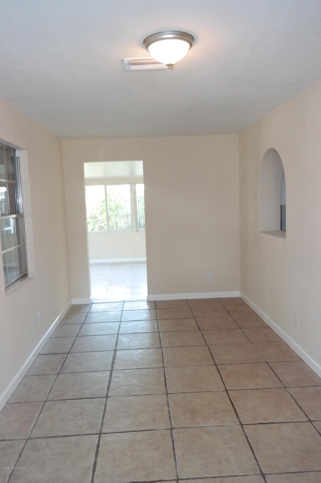 984 Kings Post Road Rockledge, FL 32955 - Photo 12 of 29 Living Room