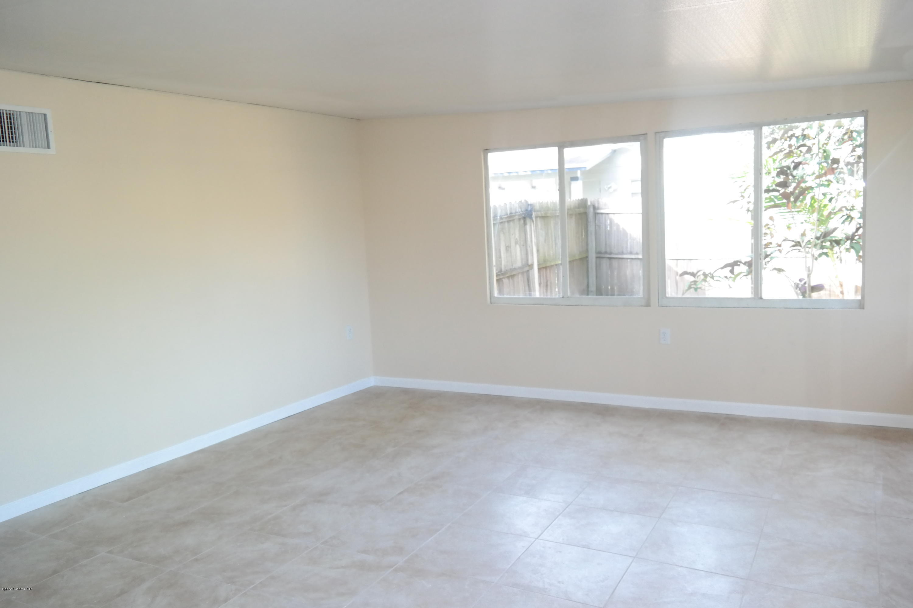 984 Kings Post Road Rockledge, FL 32955 - Photo 14 of 29 HUGE Florida Room Under Air