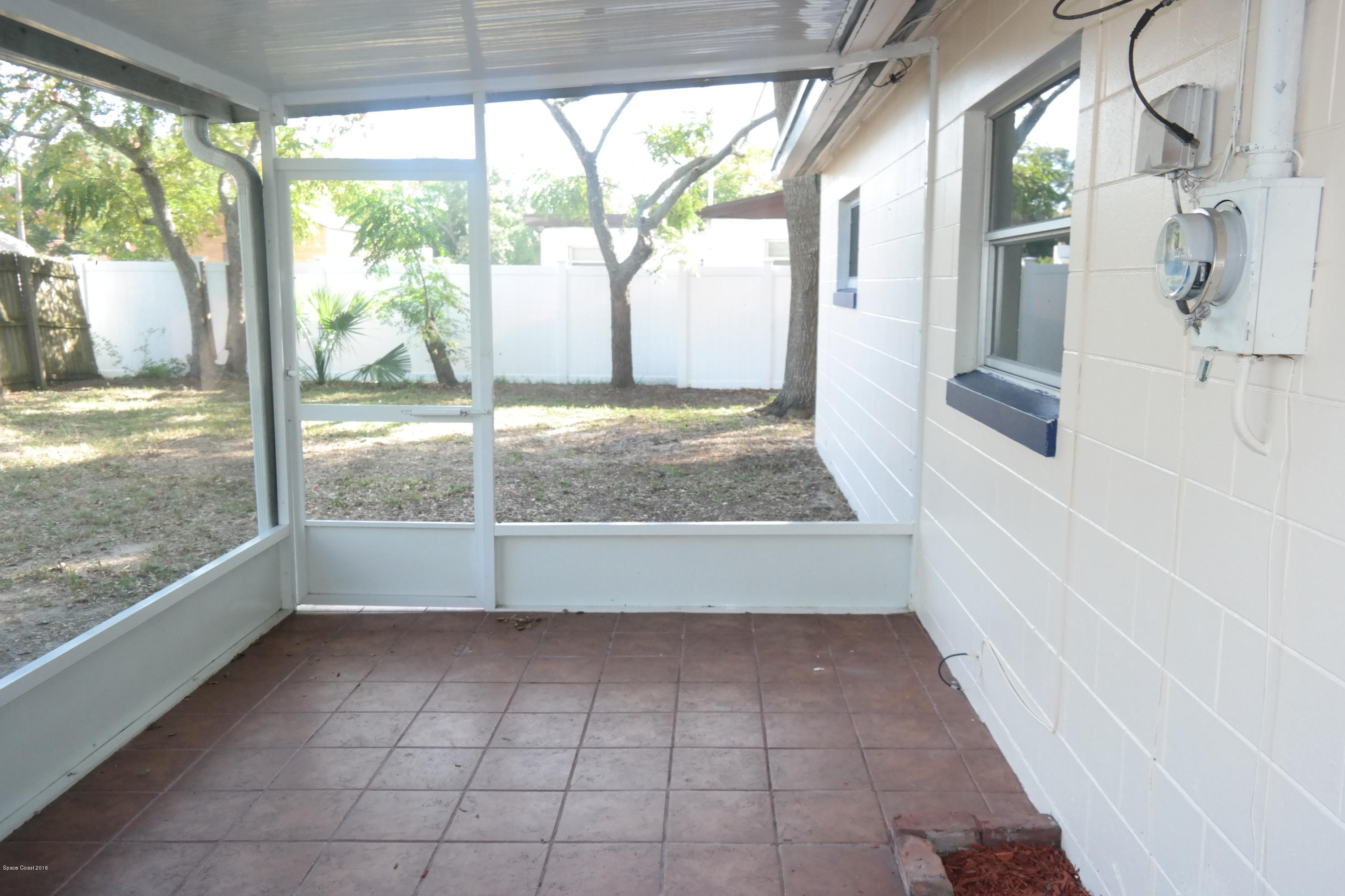 984 Kings Post Road Rockledge, FL 32955 - Photo 24 of 29 Screened in Back Porch