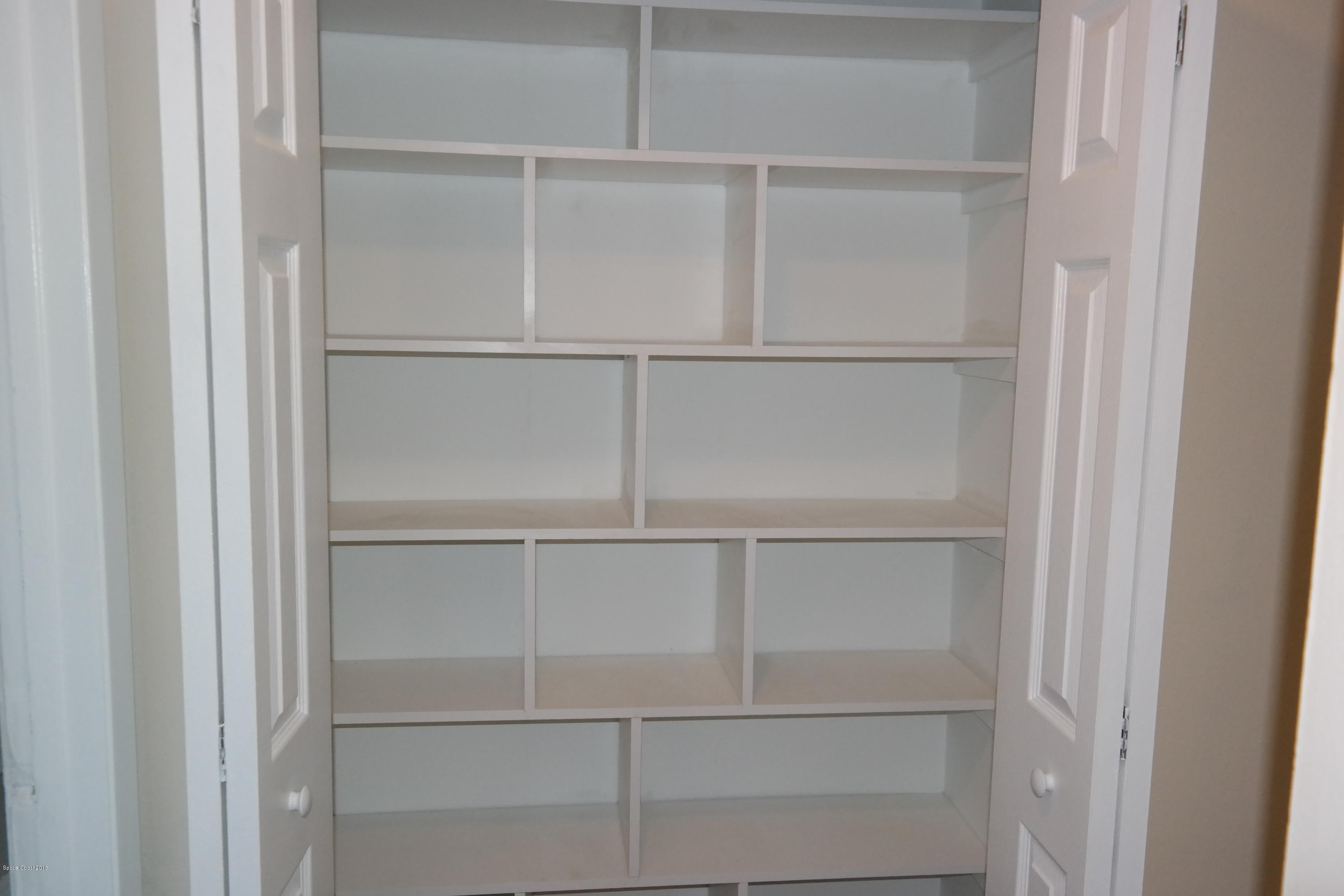984 Kings Post Road Rockledge, FL 32955 - Photo 6 of 29 Awesome Storage Closet in hall way!