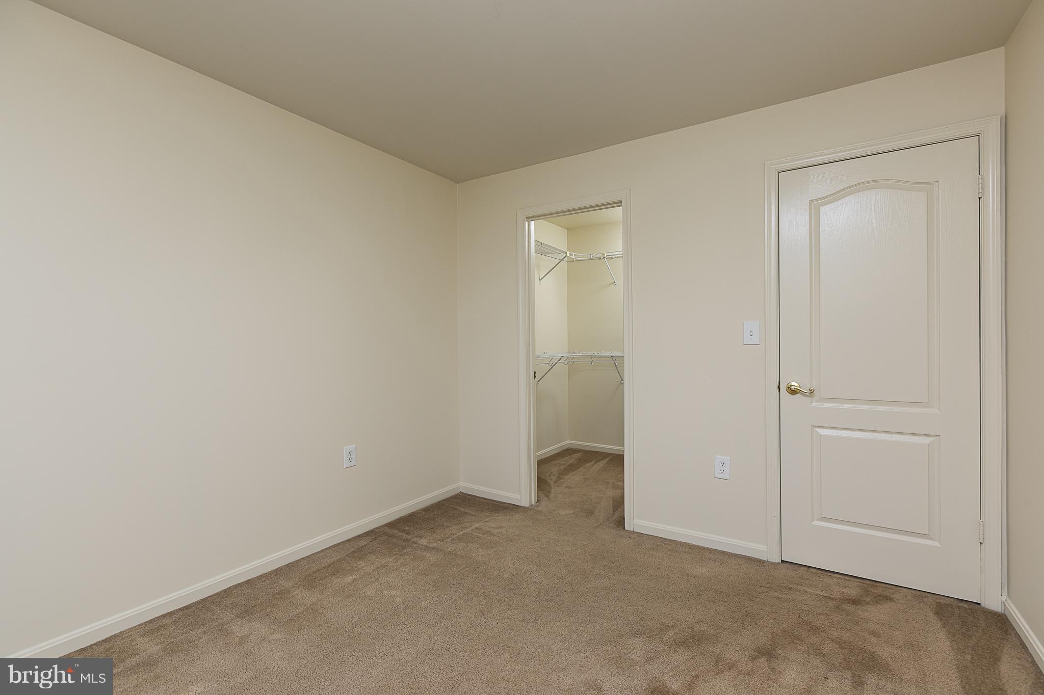 8390 Montgomery Run Road, Unit D Ellicott City, MD 21043 - Photo 15 of 19 Bedroom 2 has a walk-in closet