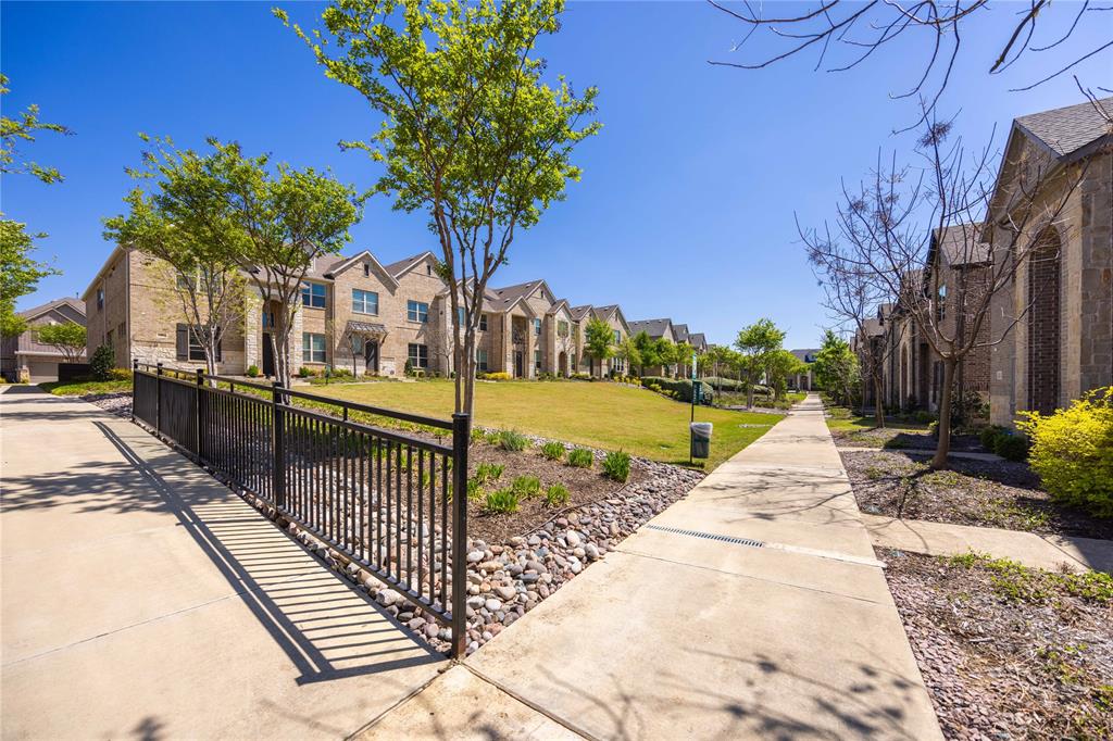 631 Cobblestone Lane Irving, TX 75039 - Photo 26 of 32 a view of a house with backyard and tree