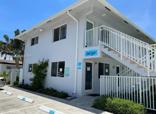 a front view of a house with a porch