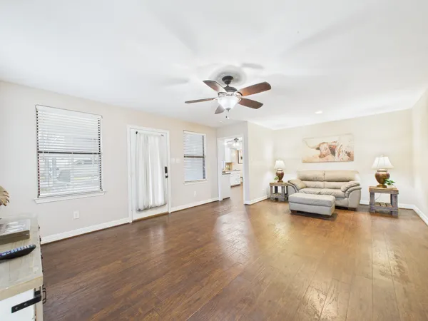 a living room with furniture and window