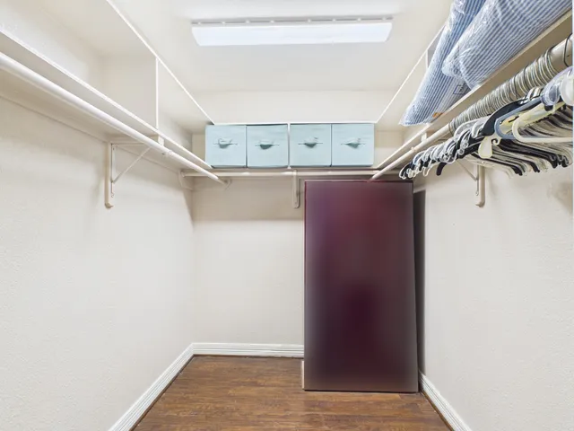 a view of a room with racks on the wall