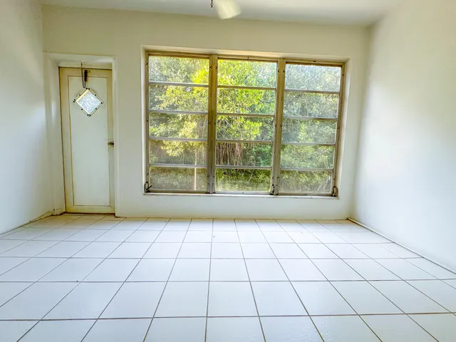 an empty room with windows