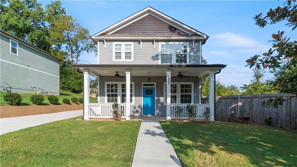 front view of a house with a yard