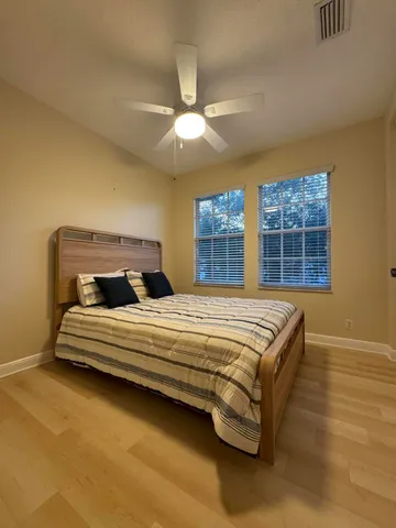 an aerial view of a house with a swimming pool yard and outdoor seating