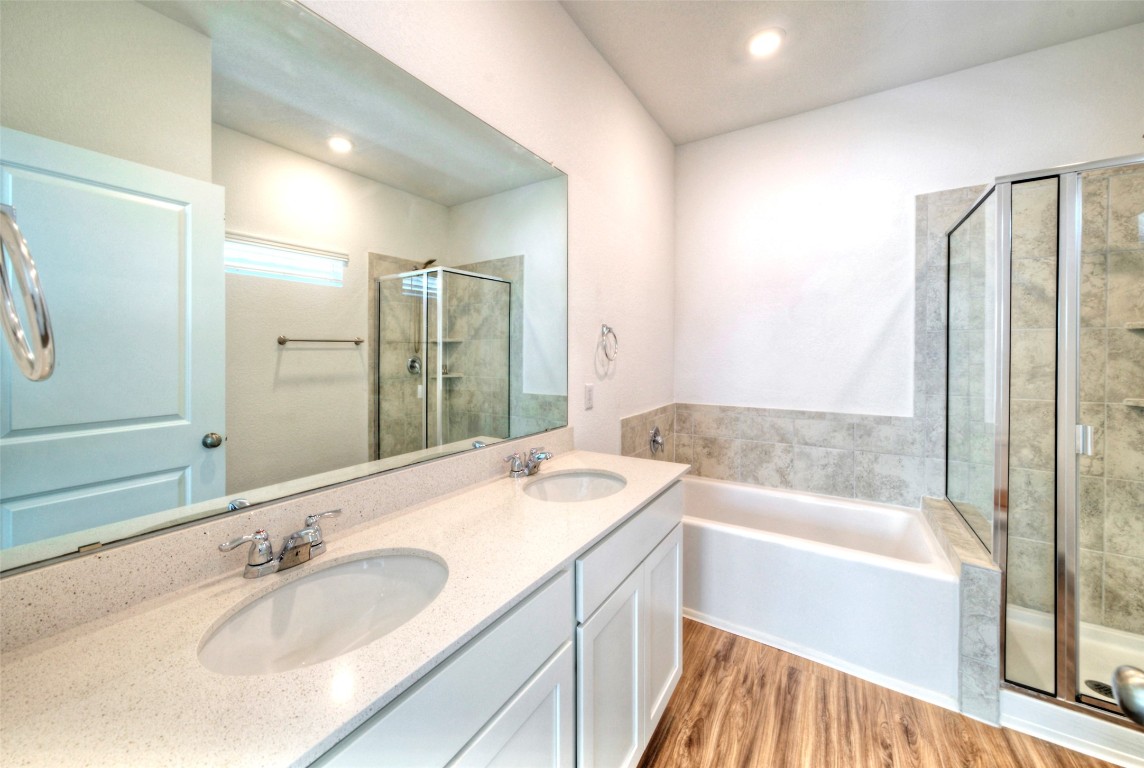 201 Rioja Kyle, TX 78640 - Photo 11 of 21 a bathroom with a bathtub and a sink