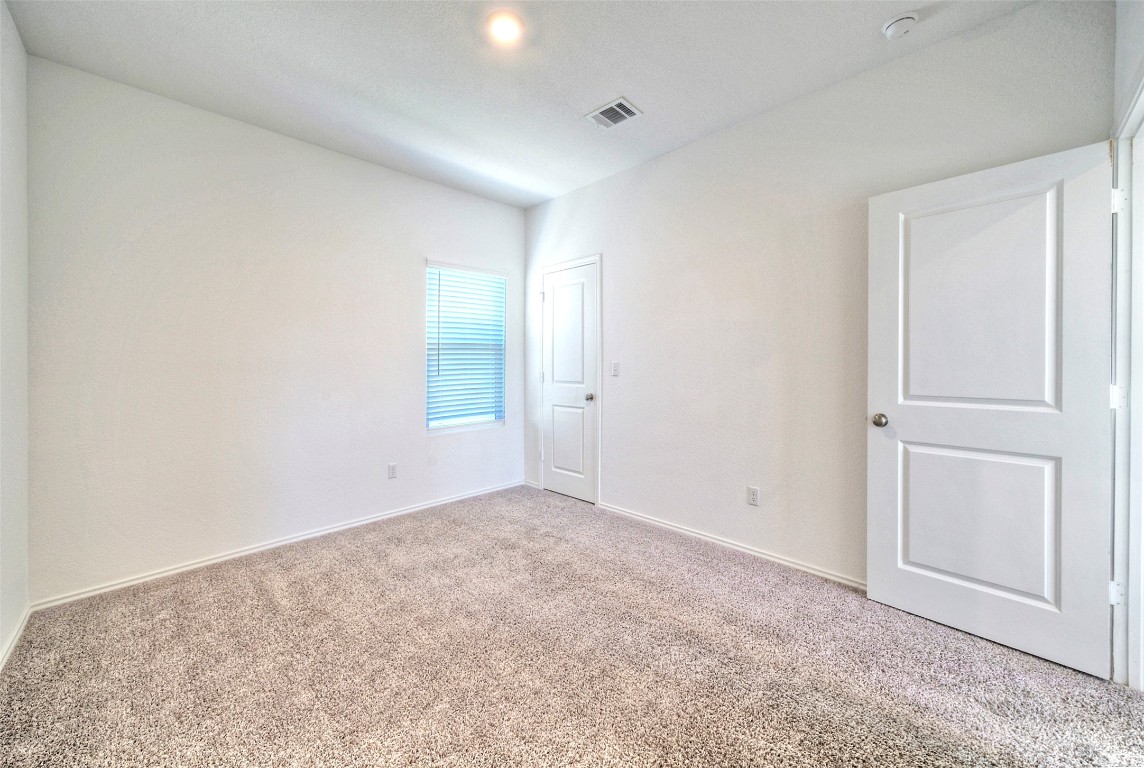 201 Rioja Kyle, TX 78640 - Photo 13 of 21 an empty room with closet area
