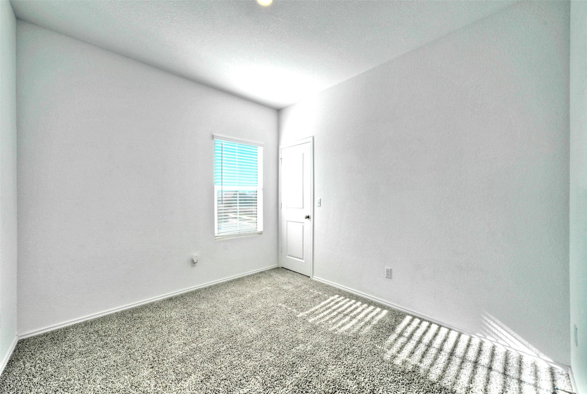 201 Rioja Kyle, TX 78640 - Photo 14 of 21 a view of an empty room and window