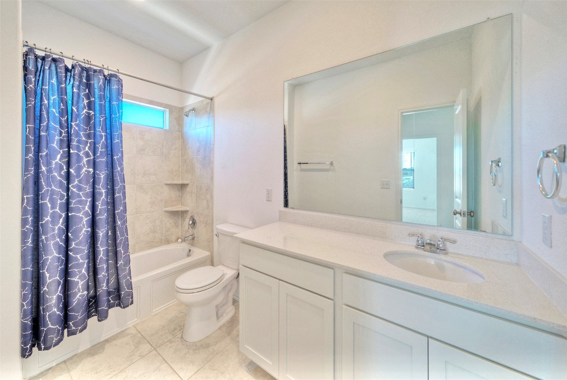 201 Rioja Kyle, TX 78640 - Photo 16 of 21 a spacious bathroom with a sink a toilet and shower