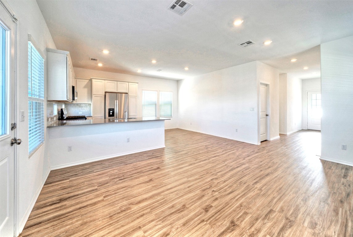 201 Rioja Kyle, TX 78640 - Photo 4 of 21 a view of a kitchen from the hallway