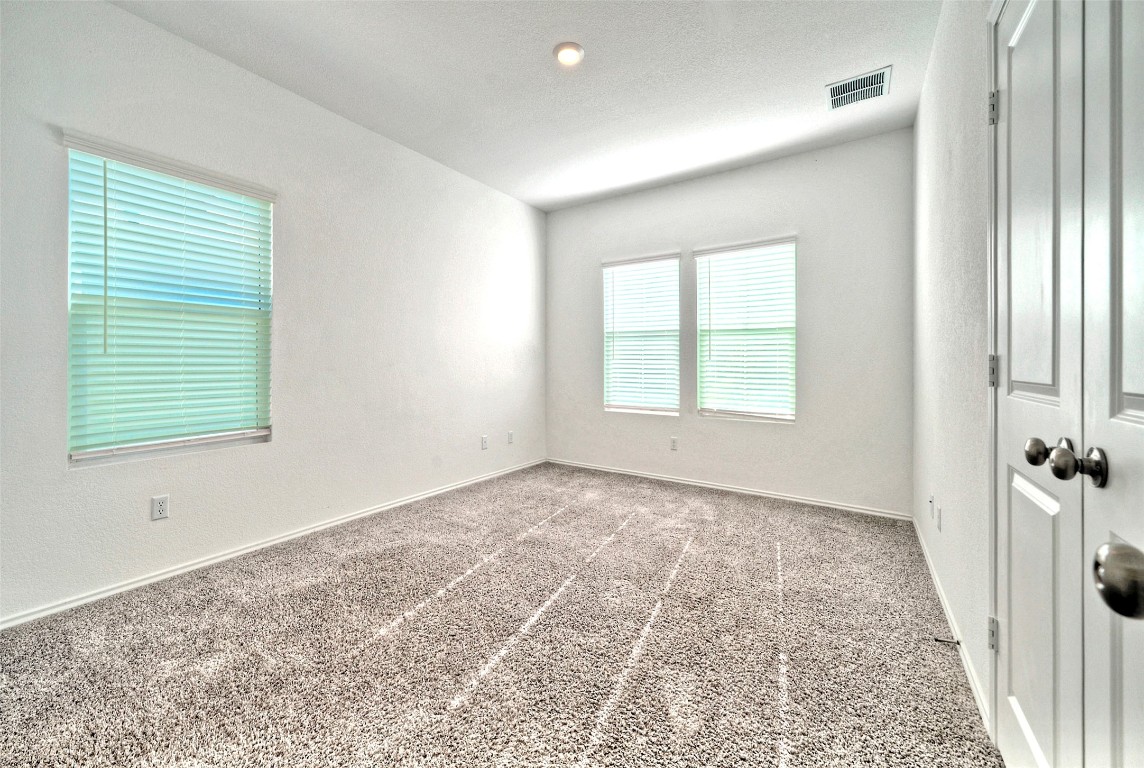 201 Rioja Kyle, TX 78640 - Photo 9 of 21 a view of an empty room with a window