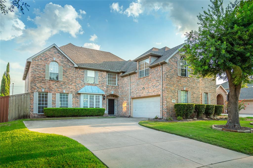 3328 San Patricio Drive Plano, TX 75025 - Photo 1 of 1 a front view of a house with a yard and garage