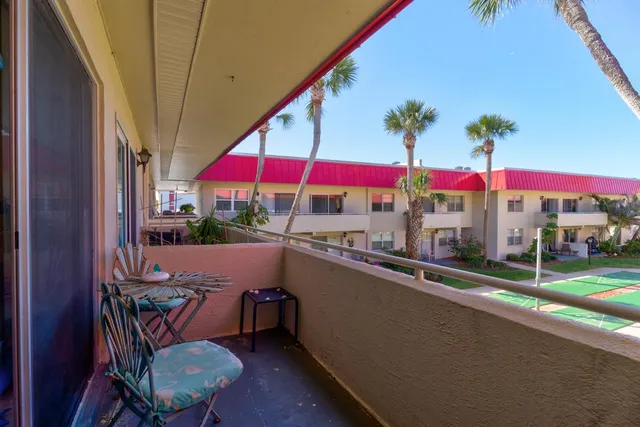 an outdoor space with furniture