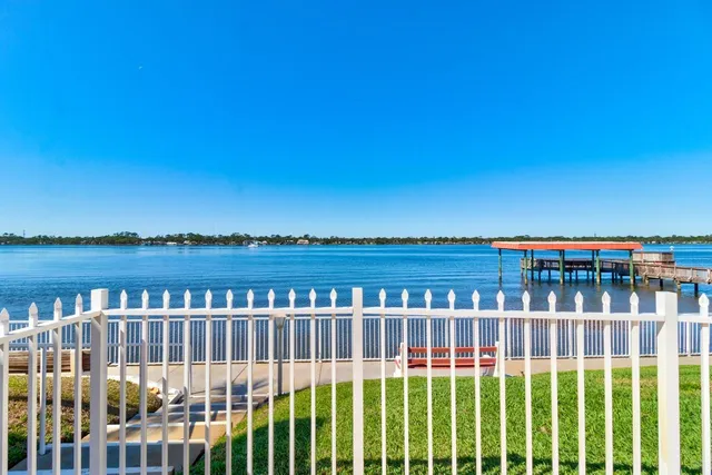 a view of a lake from a balcony