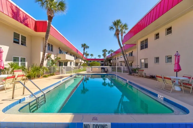 a view of an buildings with swimming pool