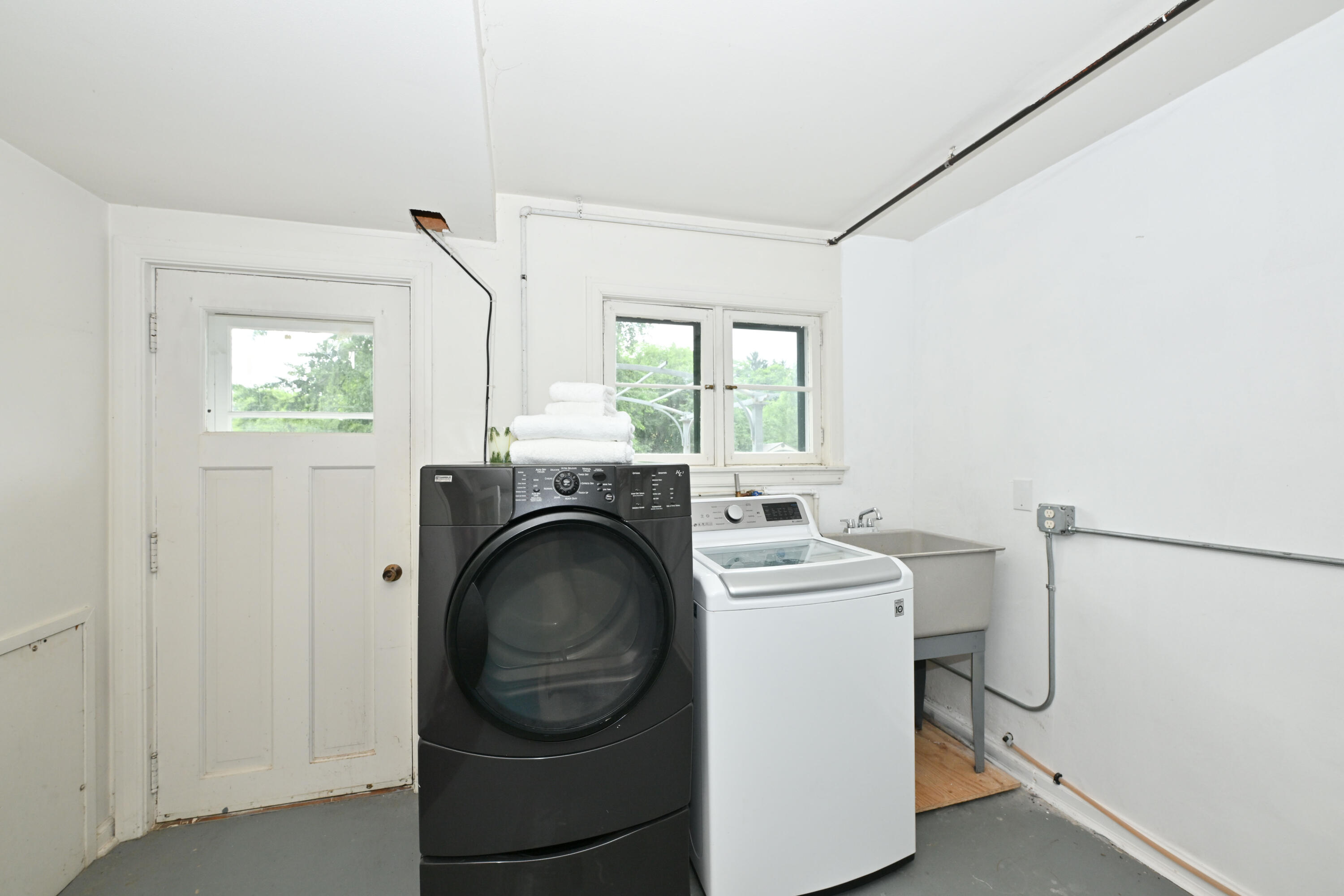 1933 West Donges Bay Road Mequon, WI 53092 - Photo 34 of 36 large utility room w/laundry