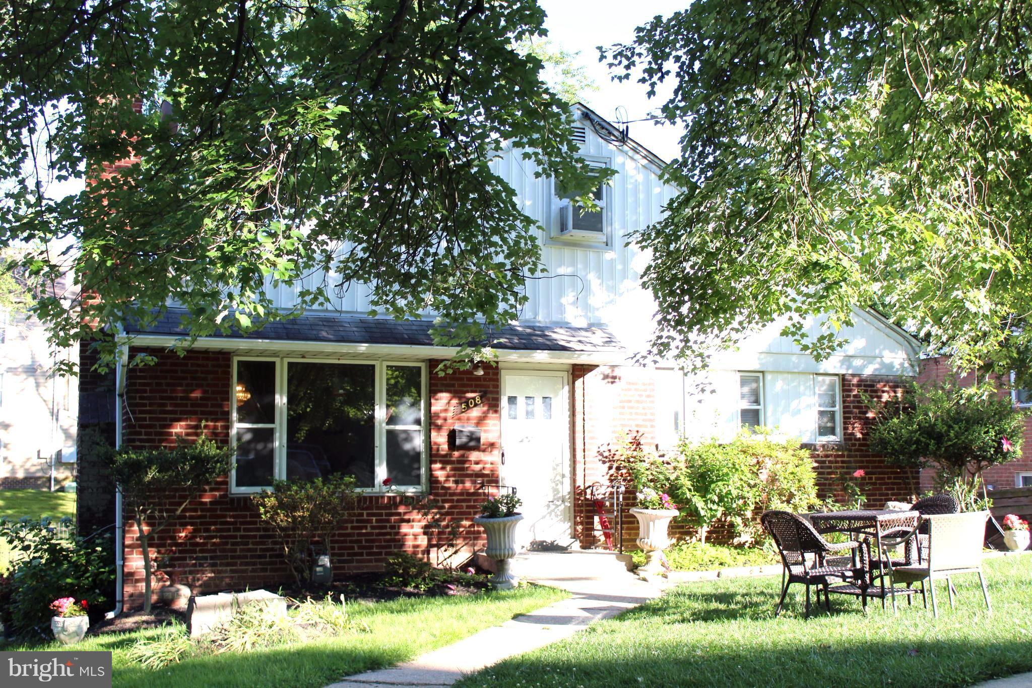 508 Royalton Road Silver Spring, MD 20901 - Photo 1 of 1 a front view of a house with garden