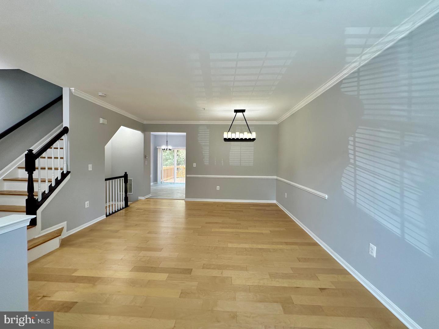 15503 Kennett Square Way Brandywine, MD 20613 - Photo 2 of 32 a view of a livingroom with wooden floor