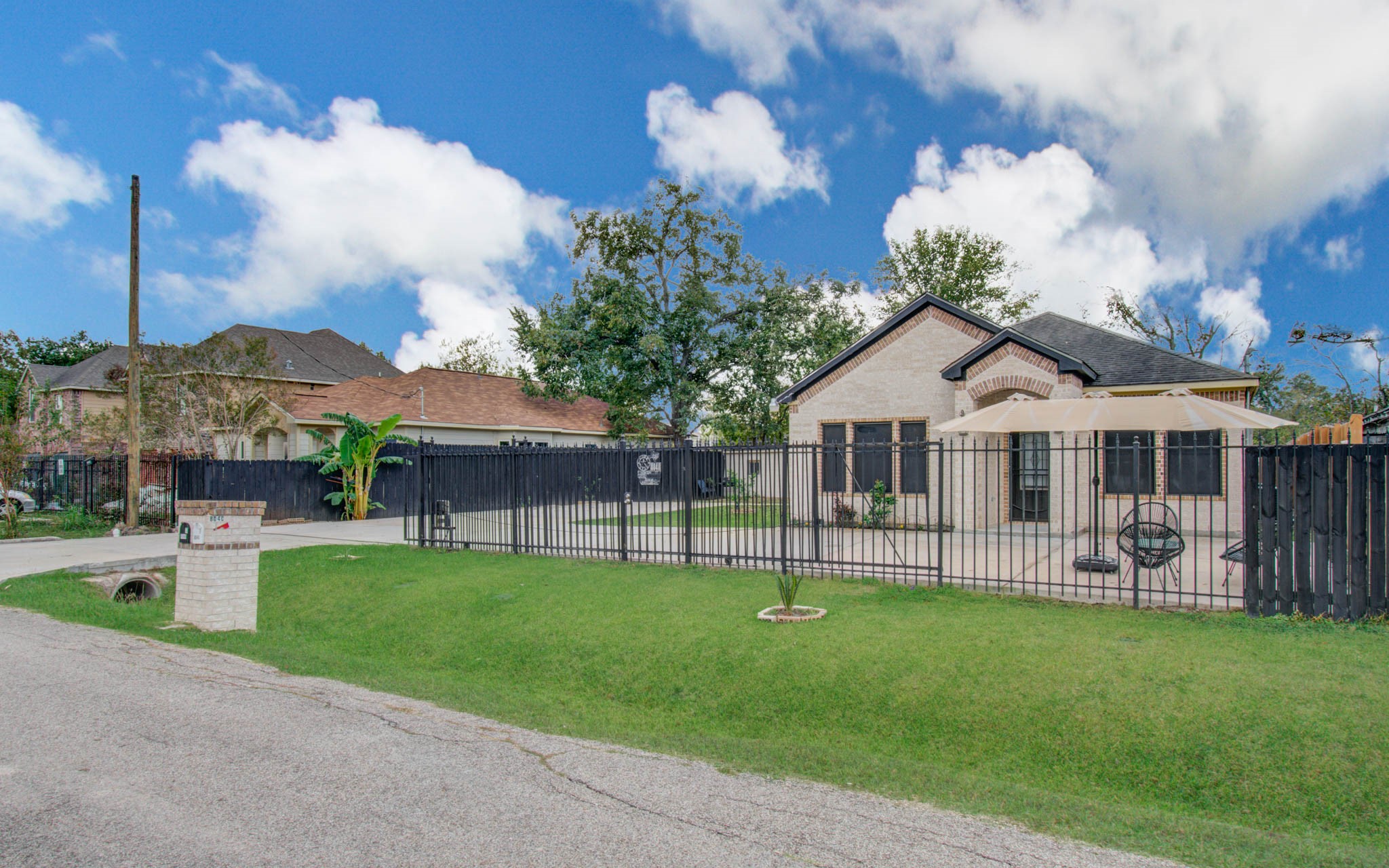 8040 Howton Street, Unit 12 Houston, TX 77028 - Photo 2 of 35 a front view of house with a garden