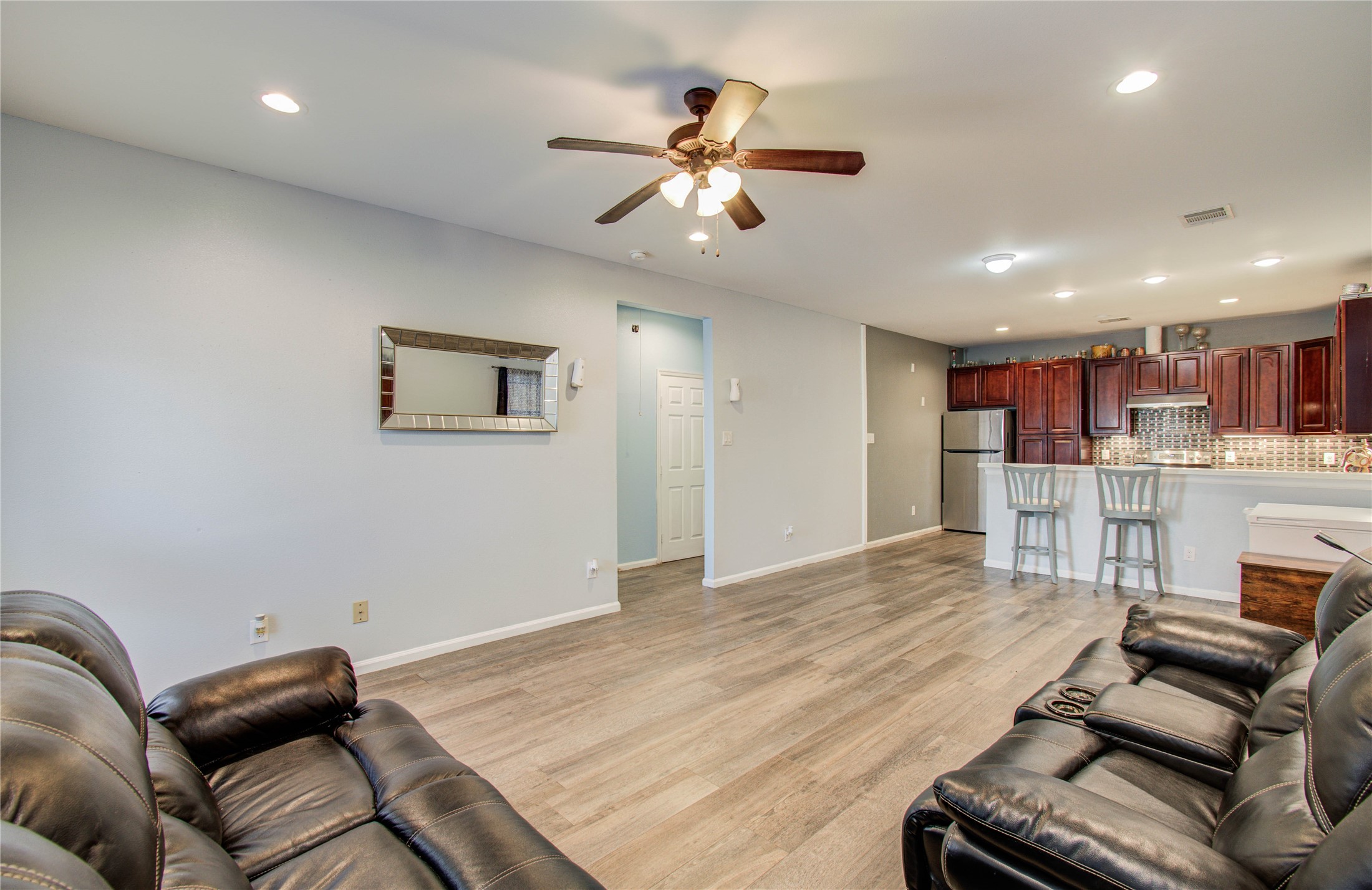 8040 Howton Street, Unit 12 Houston, TX 77028 - Photo 21 of 35 a living room with furniture and kitchen view