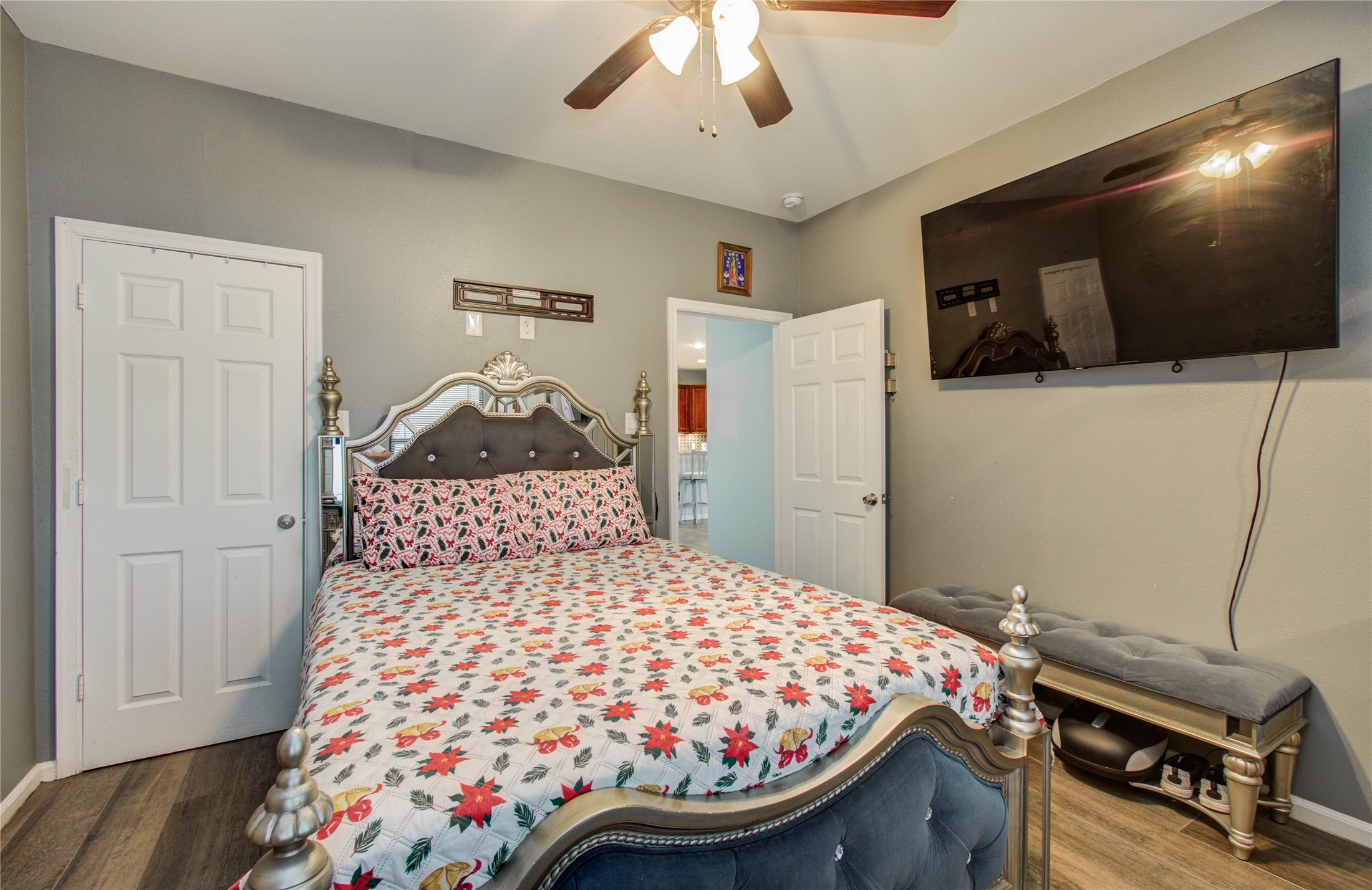 8040 Howton Street, Unit 12 Houston, TX 77028 - Photo 26 of 35 a bedroom with a bed and a flat screen tv