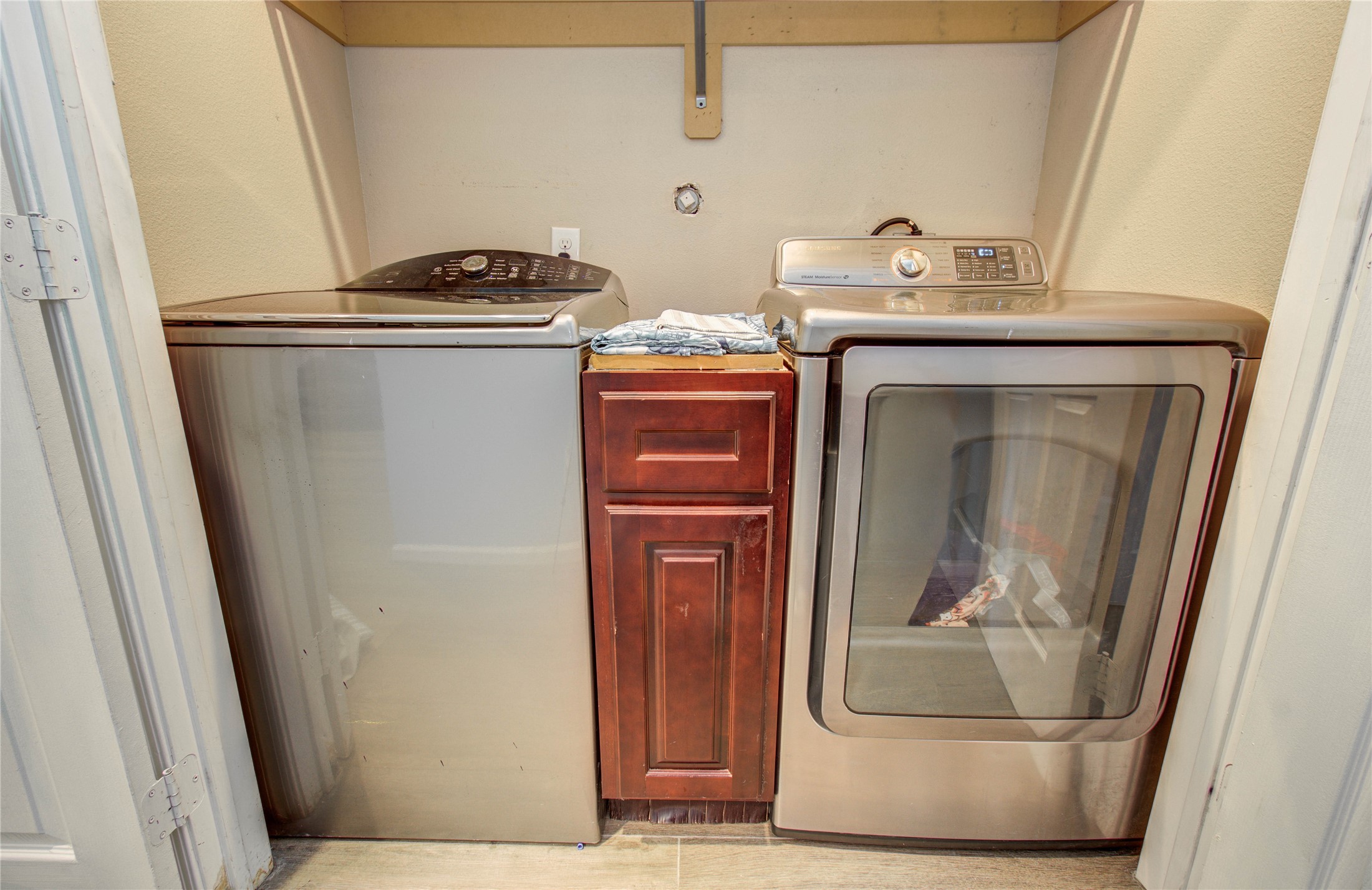 8040 Howton Street, Unit 12 Houston, TX 77028 - Photo 29 of 35 a view of washer and dryer