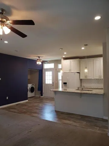 a view of a livingroom with a chandelier