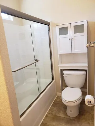 a view of a house with a street