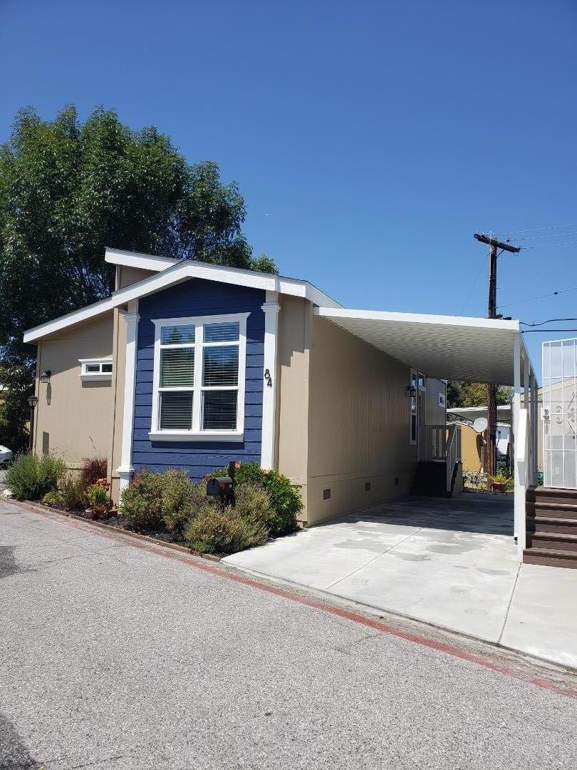 440 Moffett Boulevard, Unit 84 Mountain View, CA 94043 - Photo 3 of 38 a front view of a house with a yard