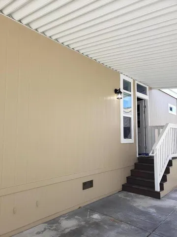 a view of a kitchen and a window