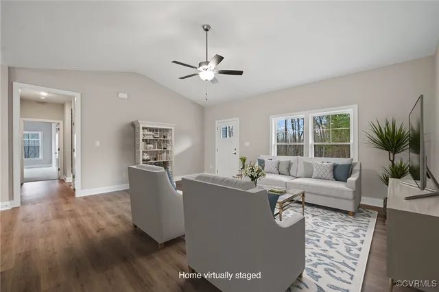 a view of a kitchen with a dishwasher cabinets and wooden floor