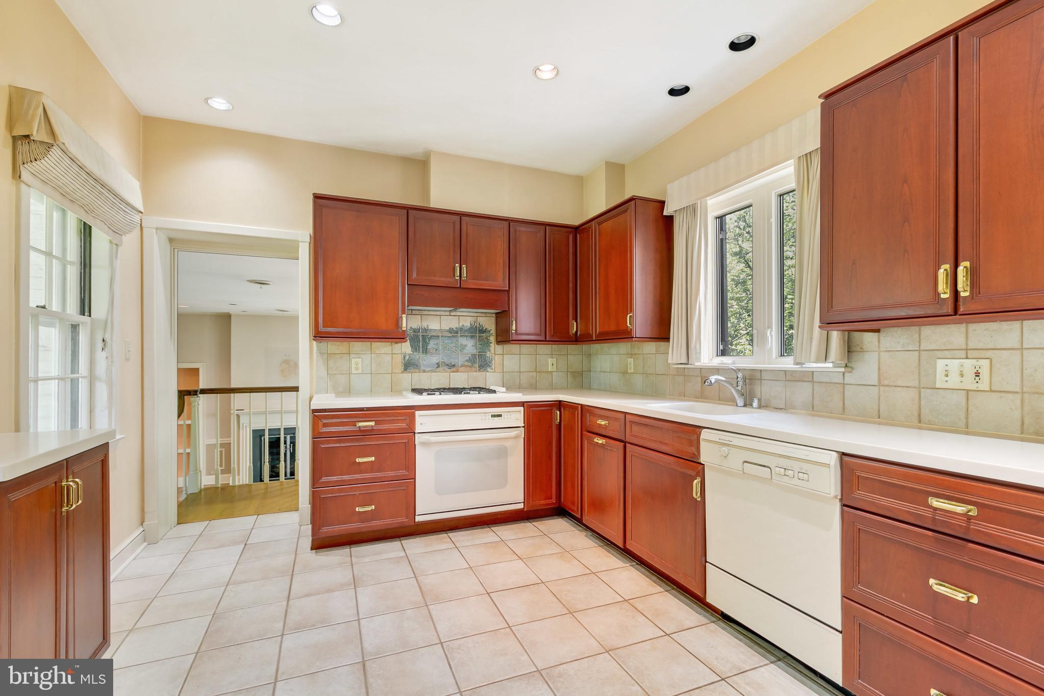 6405 Murray Hill Road Baltimore, MD 21212 - Photo 11 of 34 Kitchen opens to sunken family room
