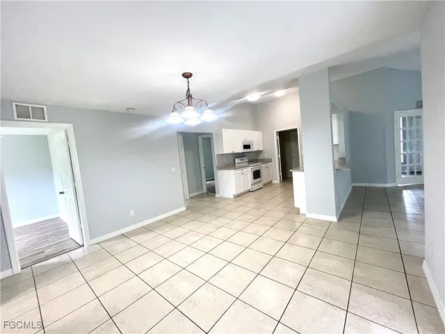 a view of a refrigerator and window