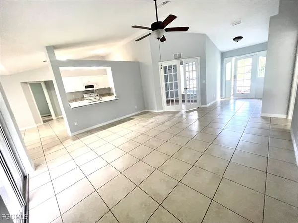 a view of an empty room and window