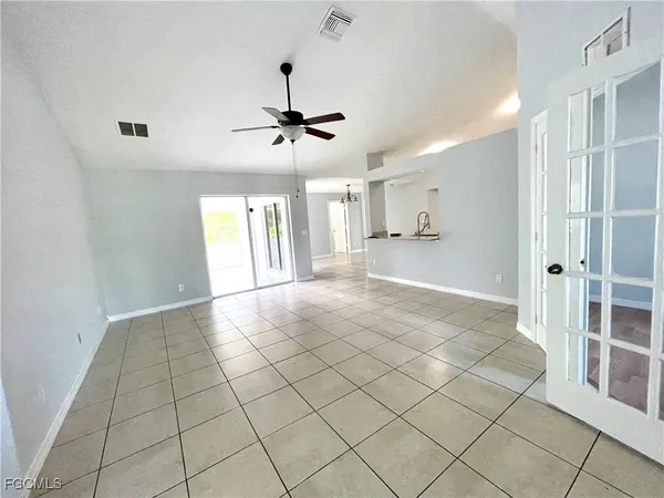 a view of an empty room and window