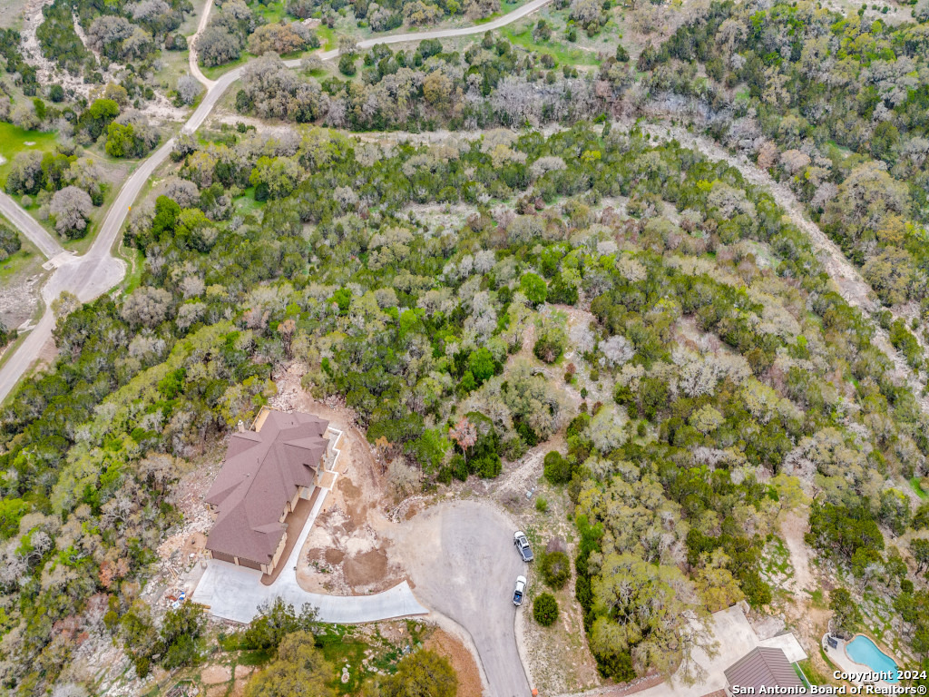 192 Macaw Lane Spring Branch, TX 78070 - Photo 12 of 22 view of a yard