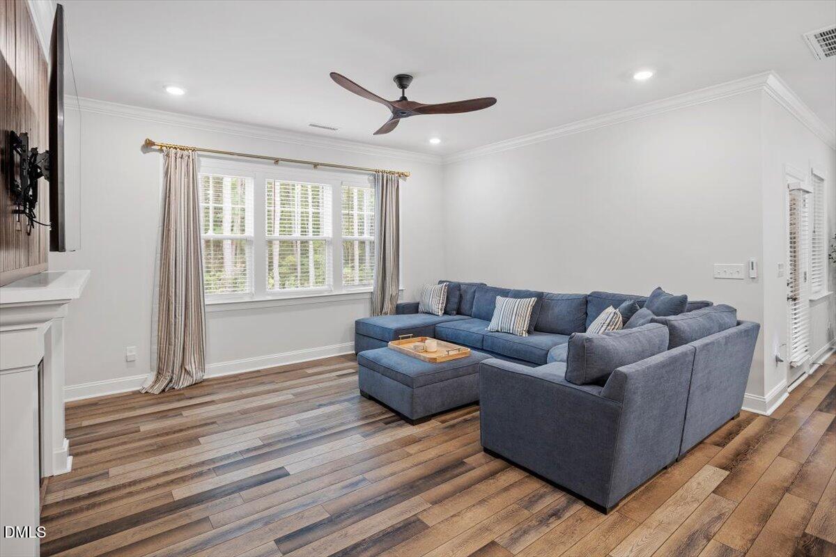3932 Mount Moran Road Raleigh, NC 27616 - Photo 17 of 40 a living room with furniture and a window