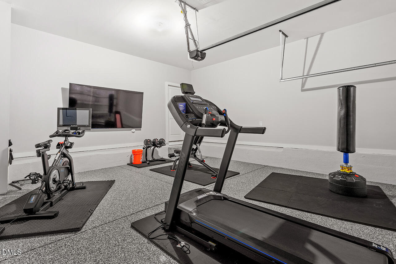 3932 Mount Moran Road Raleigh, NC 27616 - Photo 35 of 40 a view of a room with gym equipment