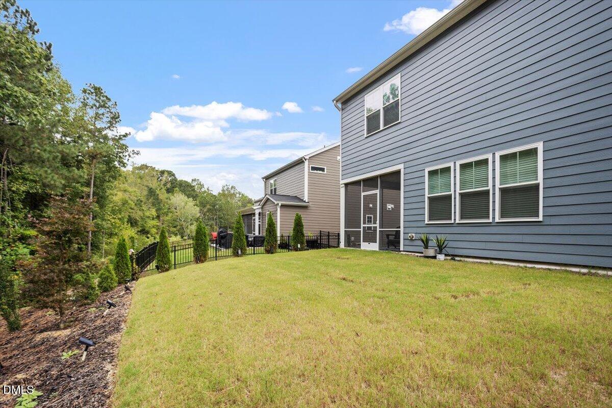 3932 Mount Moran Road Raleigh, NC 27616 - Photo 39 of 40 a view of a house with pool and garden