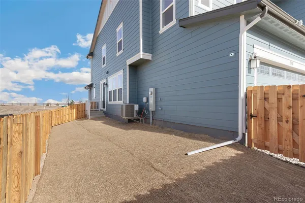 a front view of a house with a garage