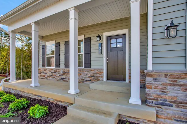 a view of a entryway door front of house